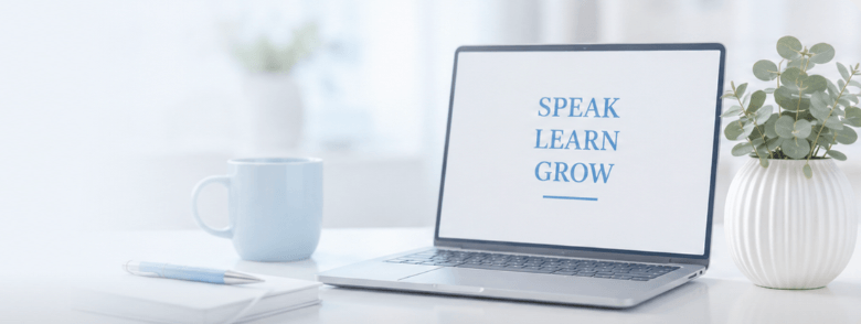 Ordinateur portable affichant Speak, Learn, Grow